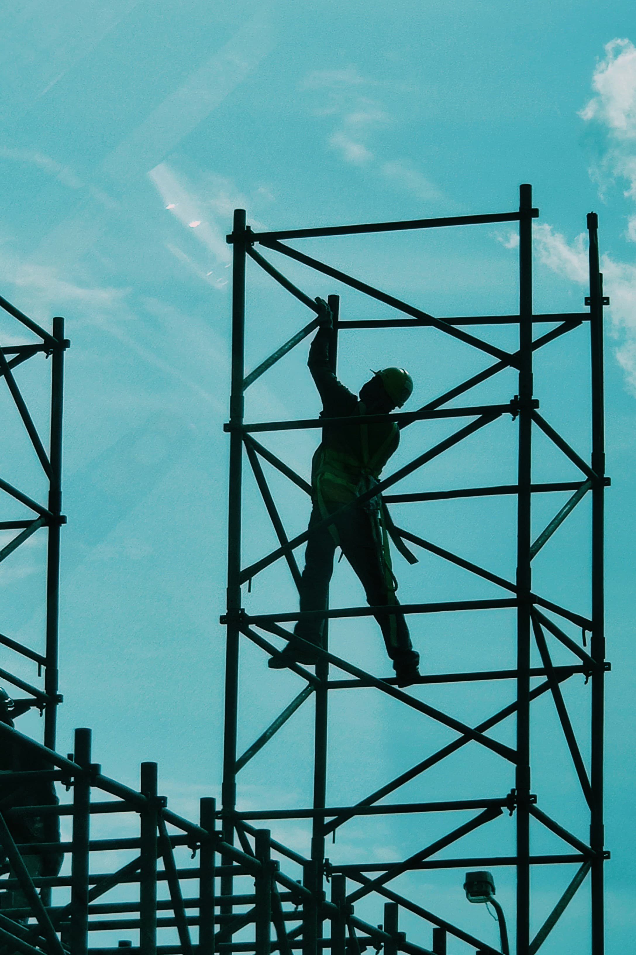 working men in a yellow background